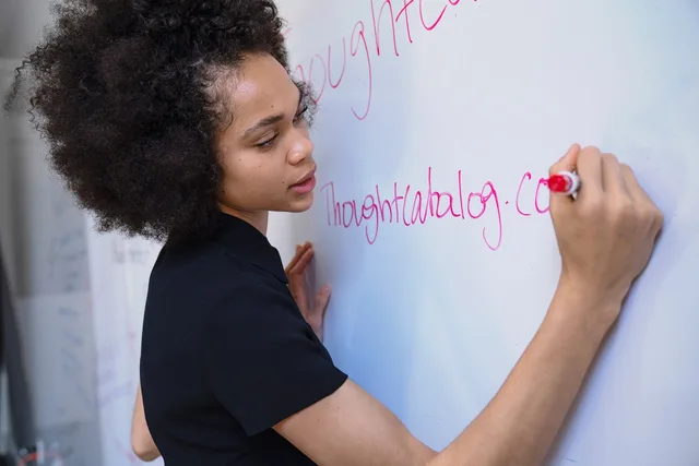 woman, writing, marker, whiteboard, brainstorm, planning, strategy, blue writing, blue plan, blue planning, whiteboard, whiteboard, whiteboard, whiteboard, whiteboard, brainstorm, brainstorm. Separating verified account facts from assumptions